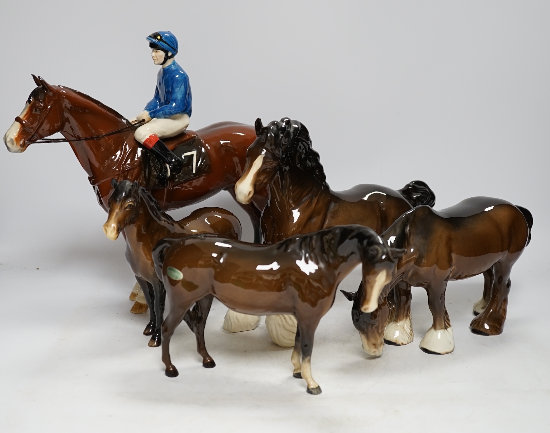 A group of five Beswick horse models including a limited edition ‘Racehorse and Jockey Bay’ 139/250, tallest 29cm. Condition - fair to good